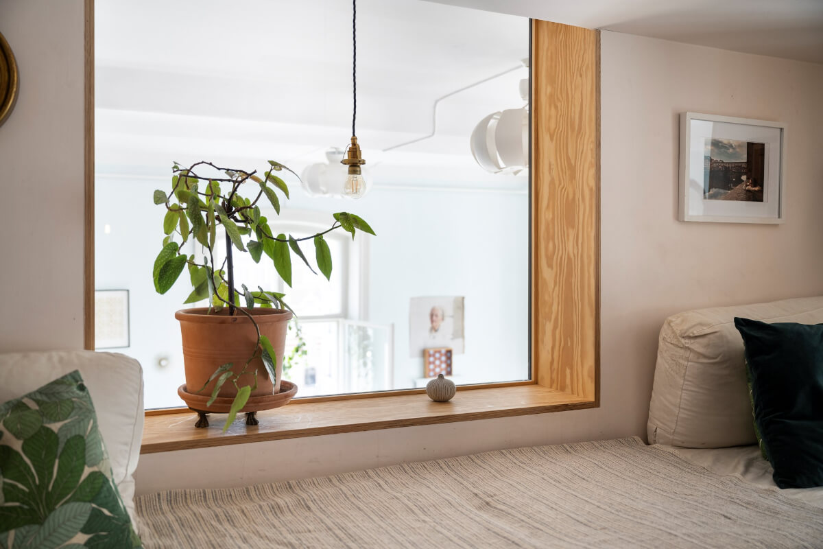 Pale Blue Walls and Huge Windows in a Swedish Loft Apartment 23 snug inner window