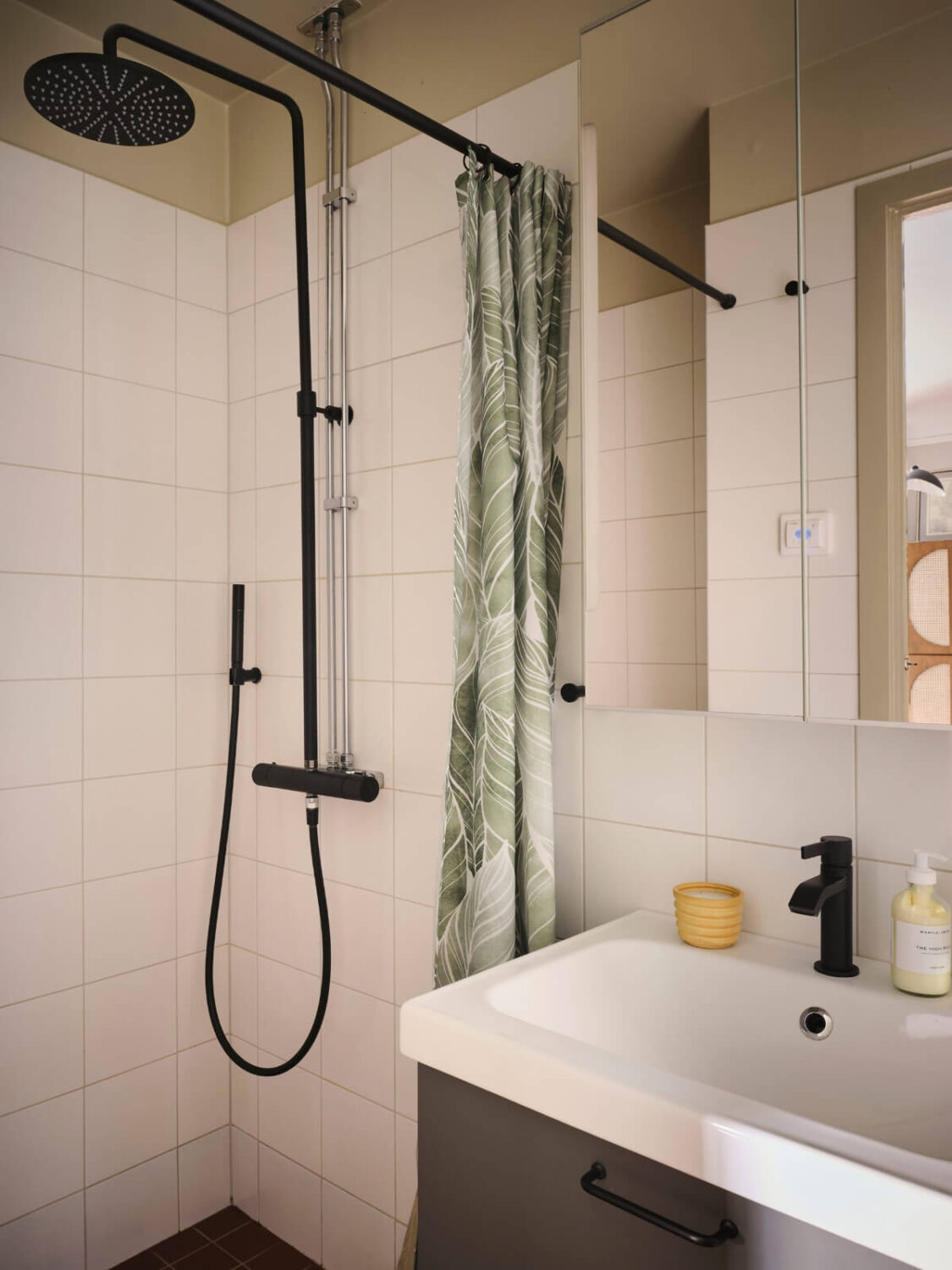 A Fantastic Small Art Nouveau Apartment in Stockholm 20 bathroom white tiles painted ceiling nordroom