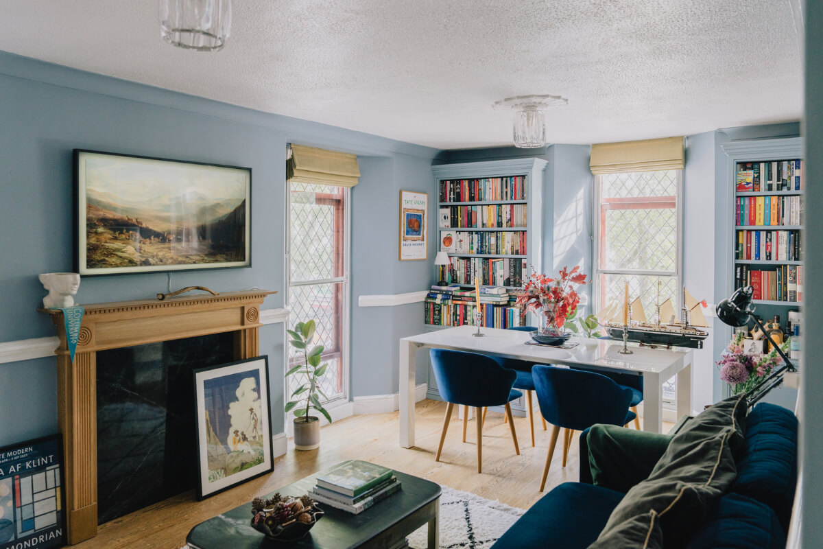A Colorful Apartment in a Former Victorian Church in London 1 blue living room fireplace