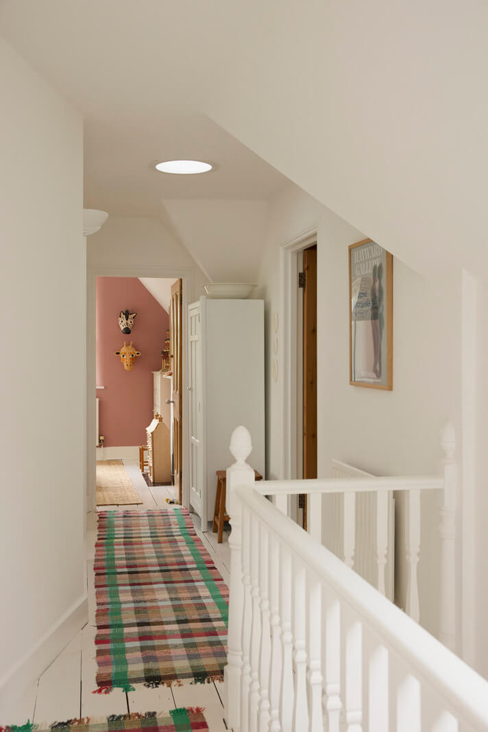 Natural Colors and Materials in a Beautiful Arts and Crafts House 29 first floor landing white-painted floorboards