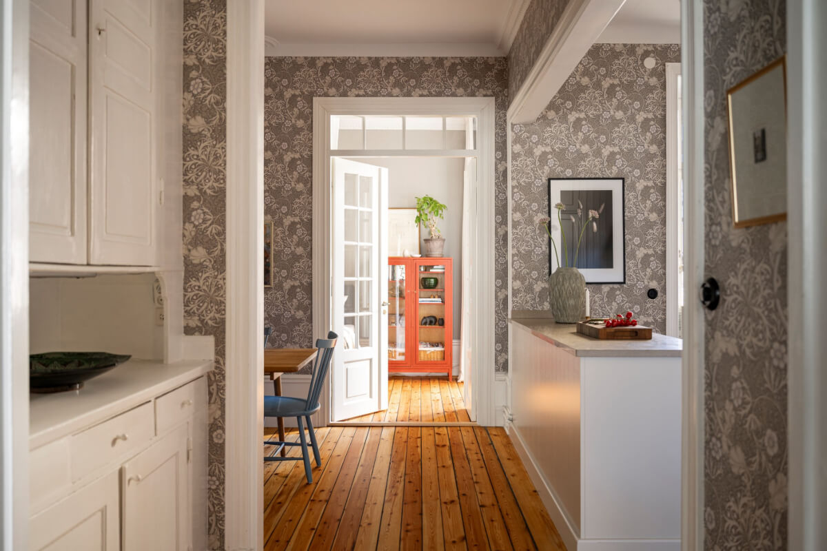 Wallpapers and Blue Tones in a Cozy Turn-of-the-Century Home 14 glass double doors