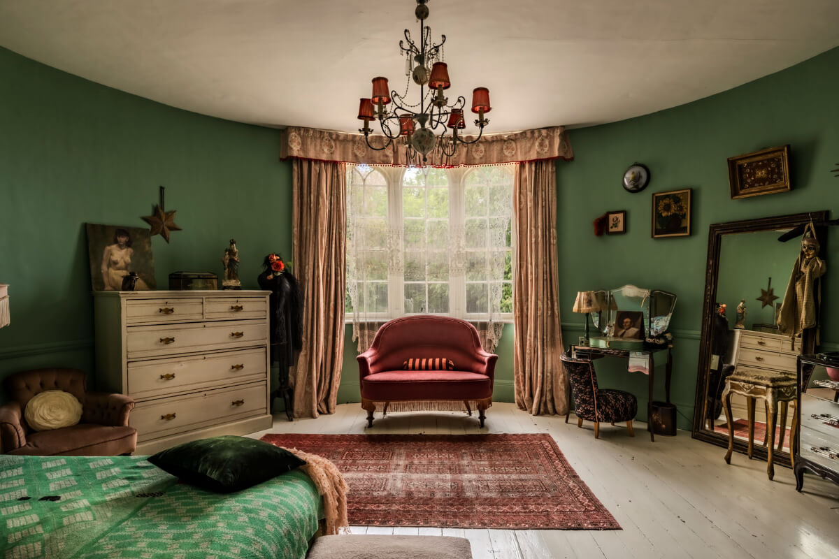 Pearl Lowe and Danny Goffey’s Eclectic Gothic Somerset Home Is For Sale 12 green bedroom rounded wall antique vanity table