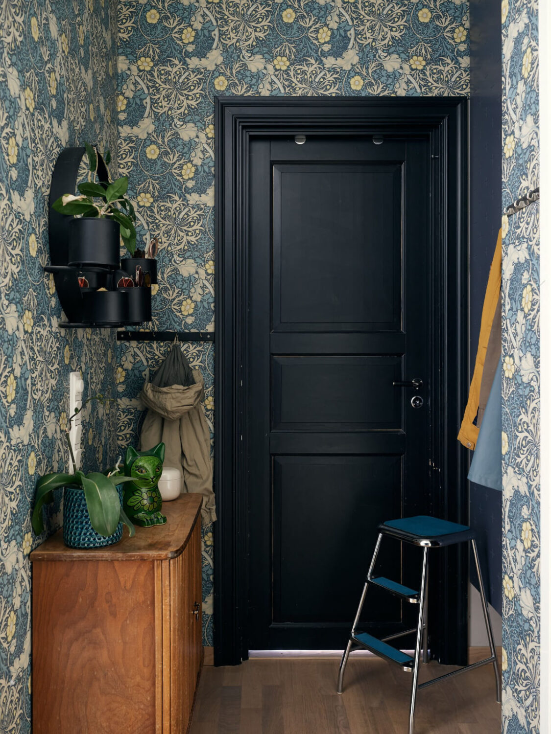 A Stunning Top-Floor Apartment with High Ceilings in a Former Church 30 hall blue wallpaper A Stunning Top-Floor Apartment with High Ceilings in a Former Church