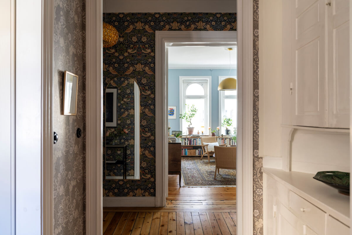 Wallpapers and Blue Tones in a Cozy Turn-of-the-Century Home 23 hall with green wallpaper