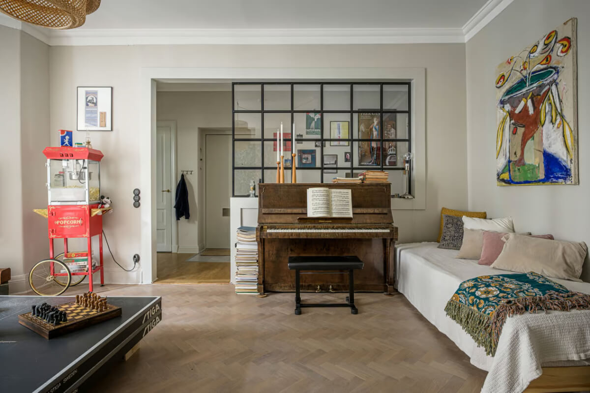 A Spacious One-Bedroom Apartment in Gothenburg 4 living room herringbone parquet floor industrial inner window nordroom