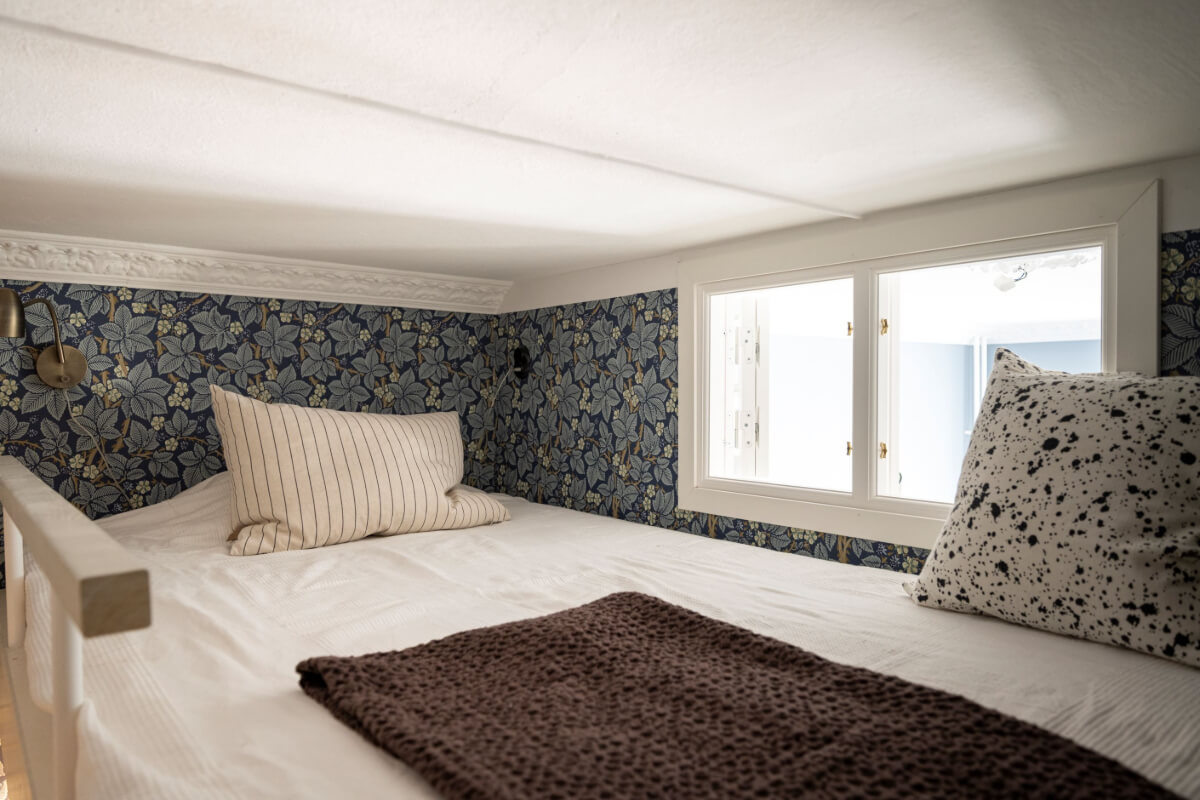 Wallpapers and Blue Tones in a Cozy Turn-of-the-Century Home 27 loft bed