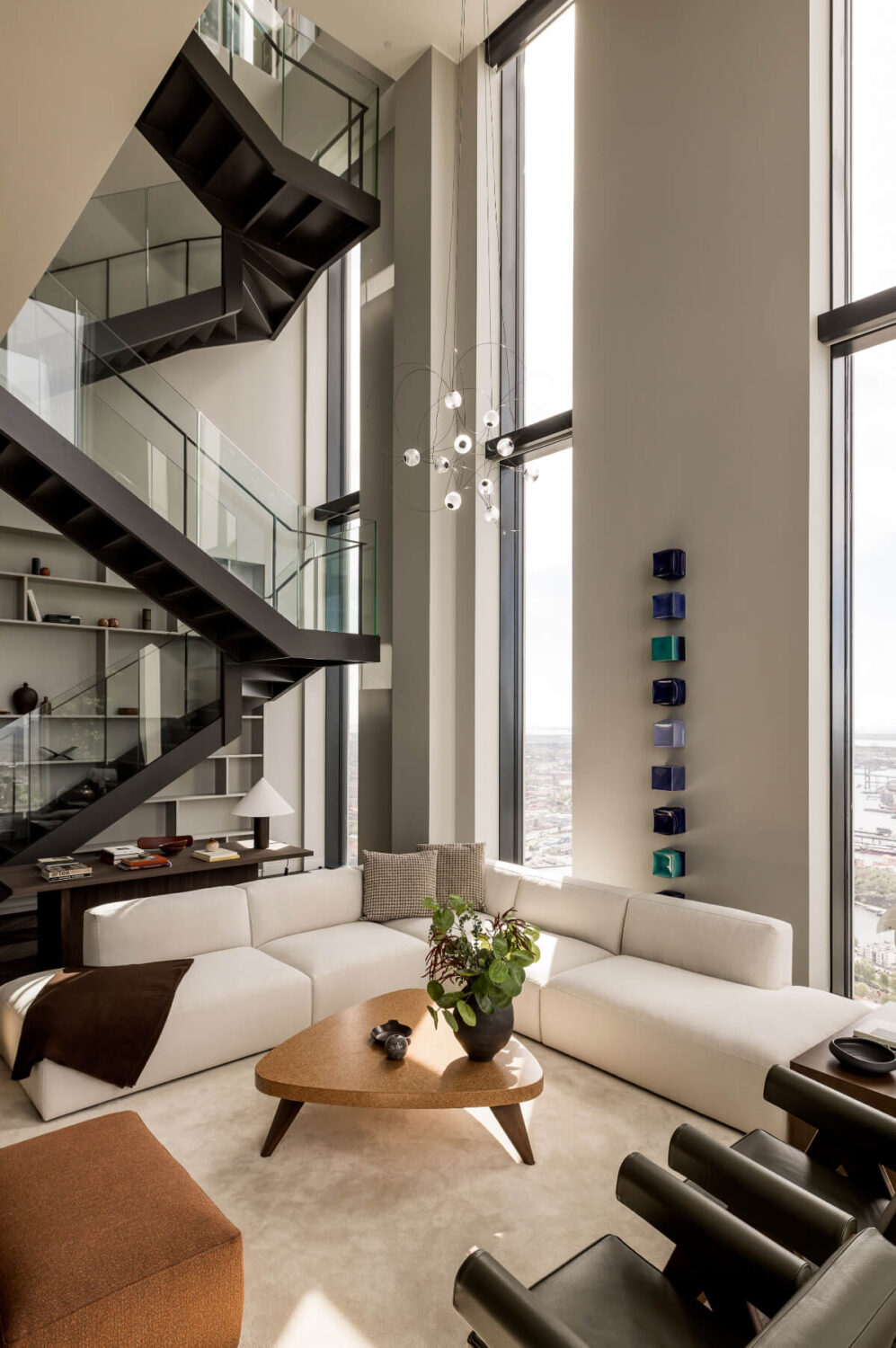 A Luxurious Three-Storey Penthouse in Sweden’s Tallest Residential Tower 4 penthouse living room steel staircase