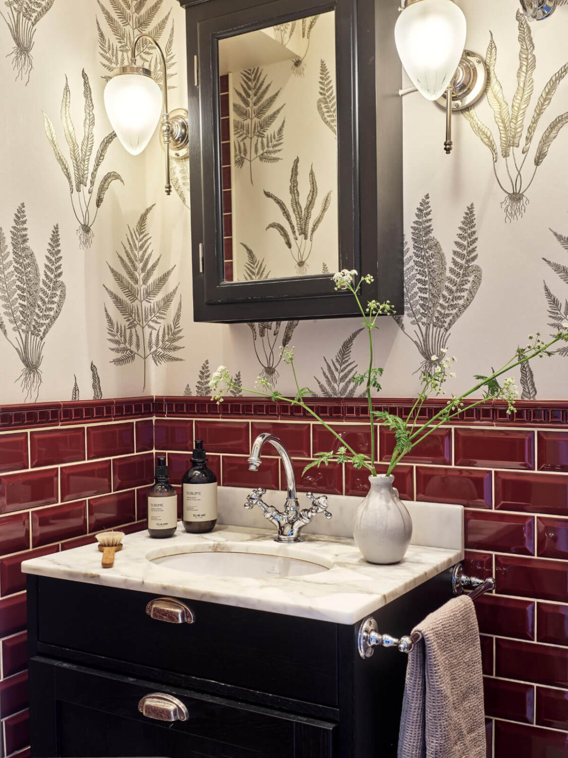 An Apartment with Original Details and a Stunning Period-Style Bathroom 26 period-style bathroom deep red tiles