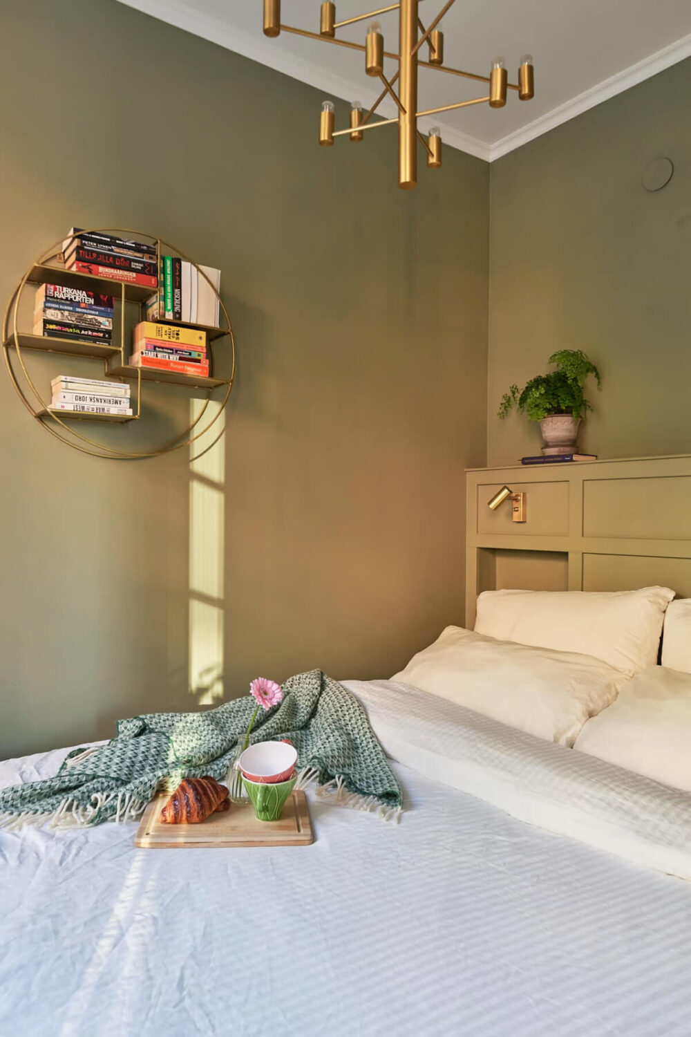A Green Swedish Corner Apartment with an Open Floor Plan 14 small green bedroom