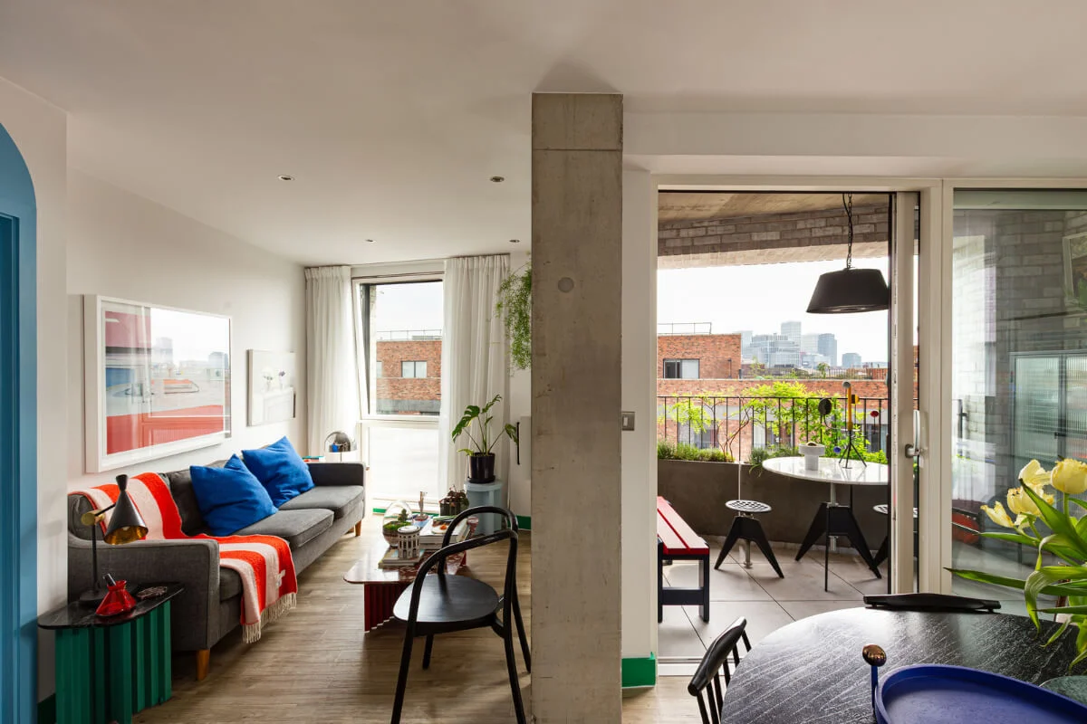 Playful Colors in a Modern One-Bedroom Apartment in London 1 small modern living room bold color accents