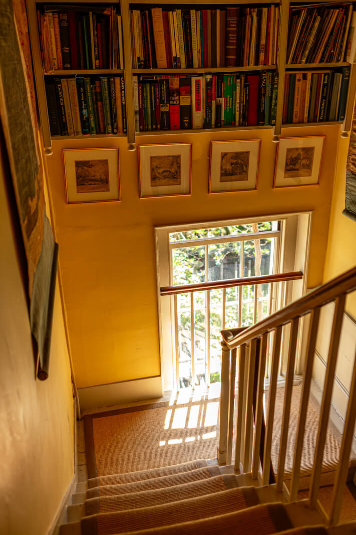 A Carefully Restored Georgian Townhouse in East London 14 staircase with bookshelves