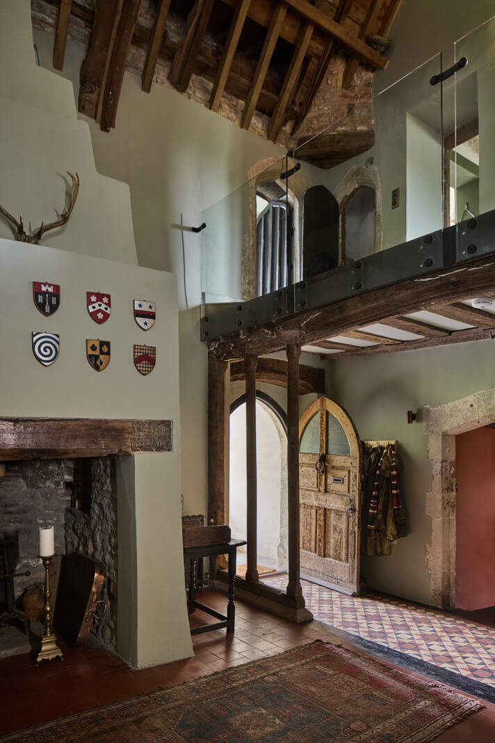 Unique Rooms and Historic Splendor in a Medieval English Country House 4 exposed beams fireplace tile floor medieval manro