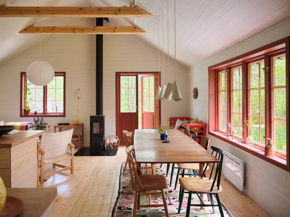 A Charming, Extended 19th-Century Log House in Sweden 7 open plan living space dining table