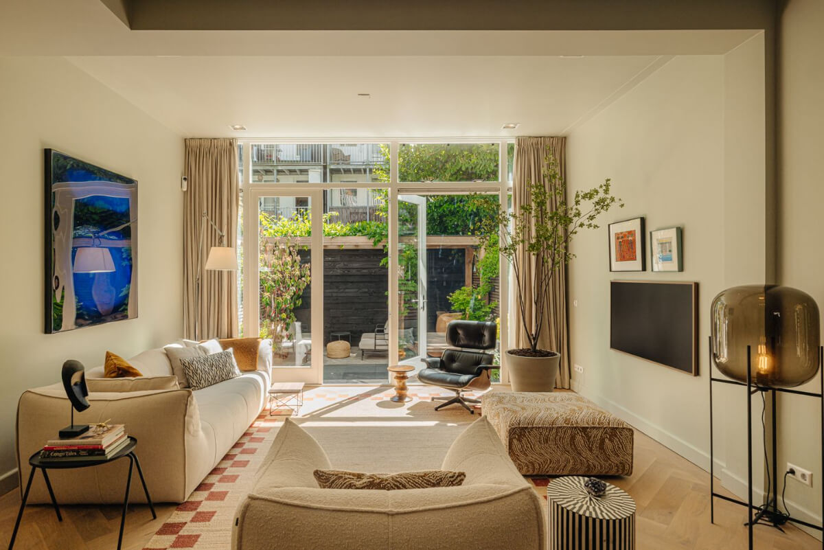 A Ground Floor Duplex Apartment with a Beautiful Modern Garden 1 serene living room garden doors