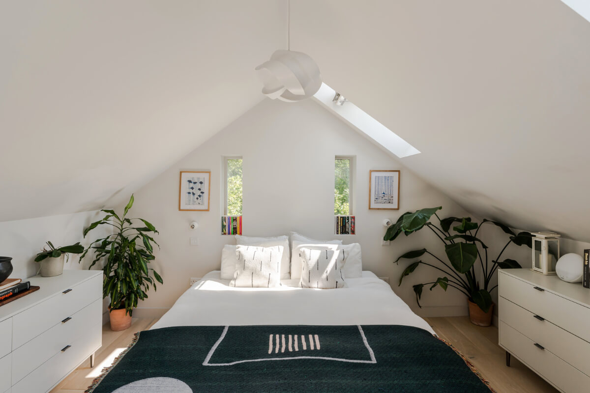 A High-Pitched Ceiling In a Light London Duplex Apartment 13 white bedroom slanted ceilings
