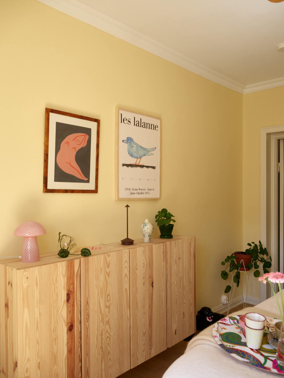 A Stockholm Apartment with a Butter-Yellow Bedroom 18 butter yellow bedroom ikea ivar cabinets