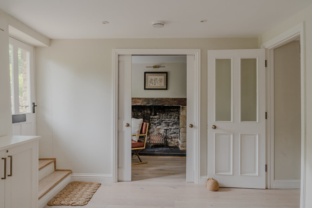 A Stone English Cottage with a Blue and Pink Kitchen 9 entry hall