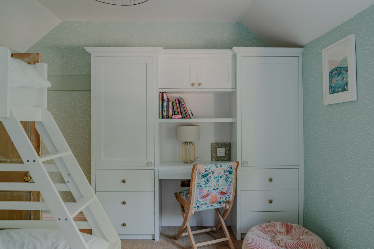 A Stone English Cottage with a Blue and Pink Kitchen 19 kids bedroom bunk bed desk