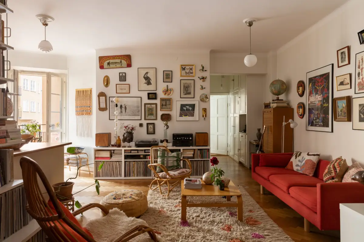 living room with art bookshelves and music storage
