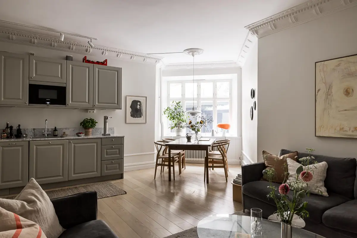 Classic Period Elements in a Comfortable Two-Bedroom Apartment 1 scandinavian living space stucco gray kitchen