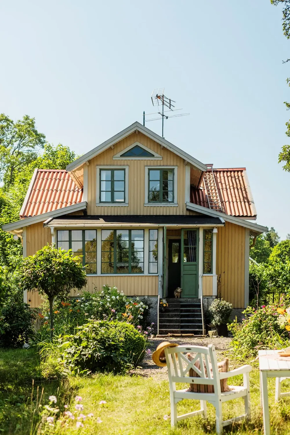 A Historic Lakeside Summer House in the Stockholm Archipelago 26 yellow swedish country home