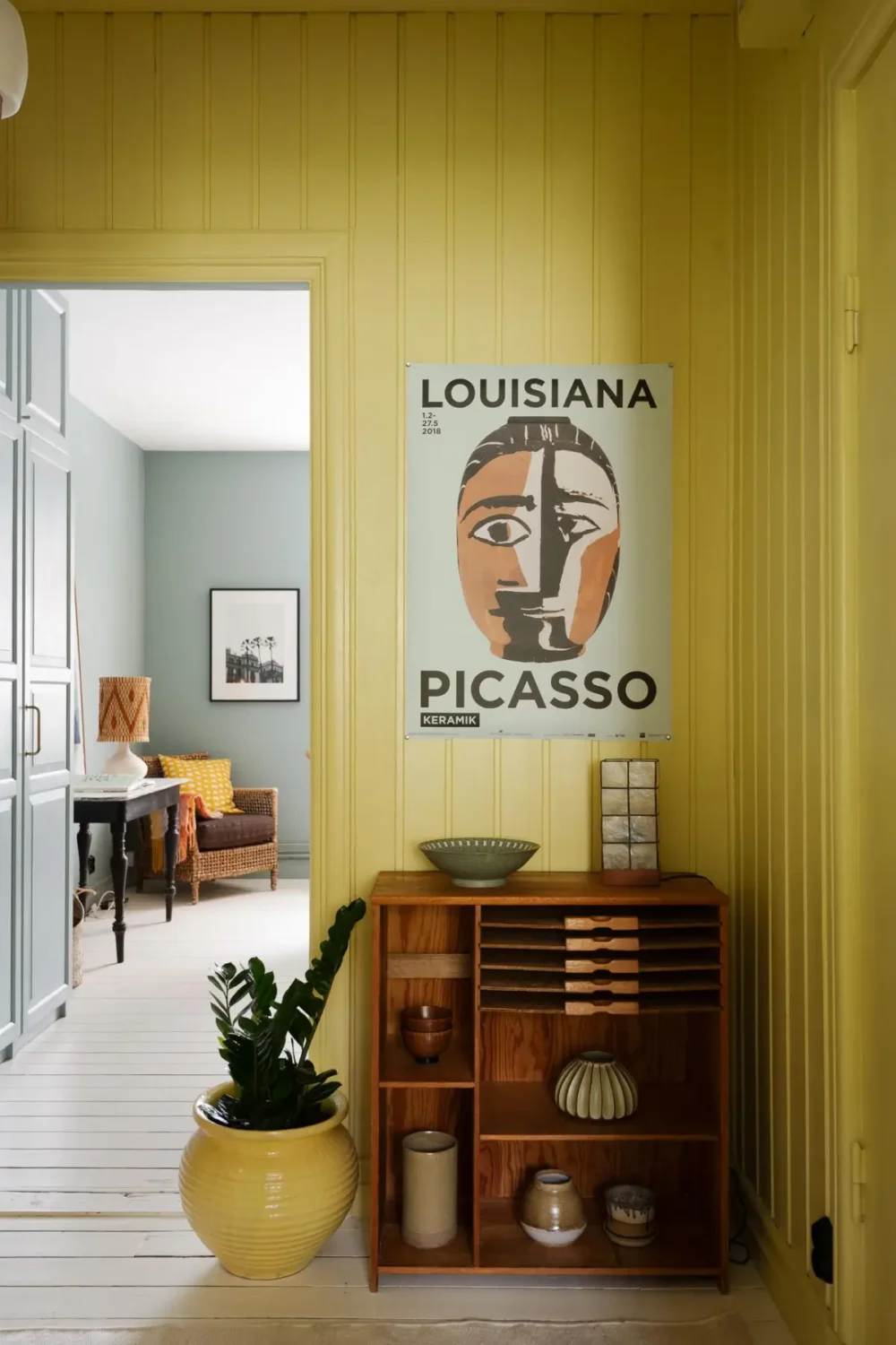 The 2027 Color of the Year Prediction: A Shift Toward More Expressive Colors? 20 hall open cabinet yellow paneling