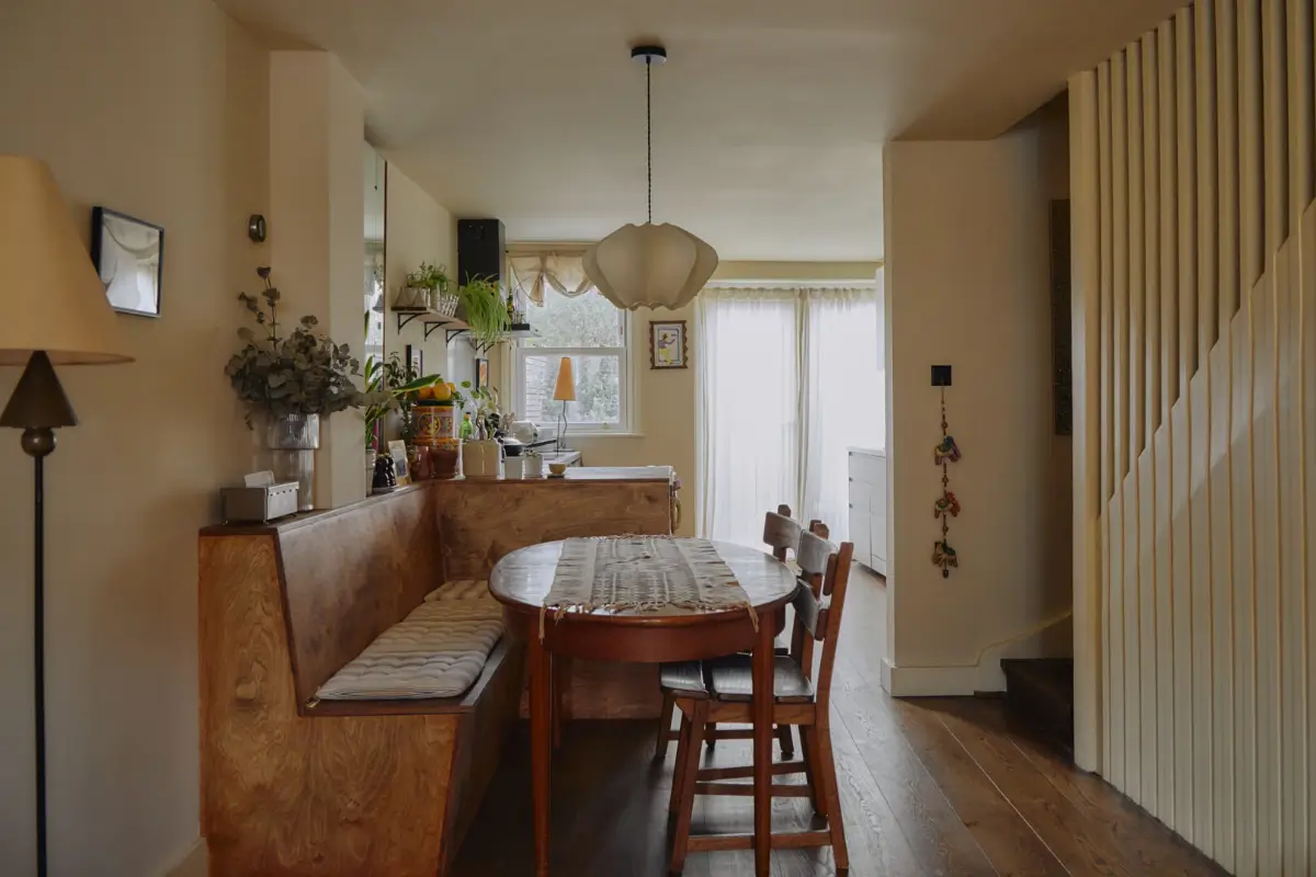 Modern Craftsmanship and Historic Charm in a London Home 4 wooden l-shaped built-in bench dining table