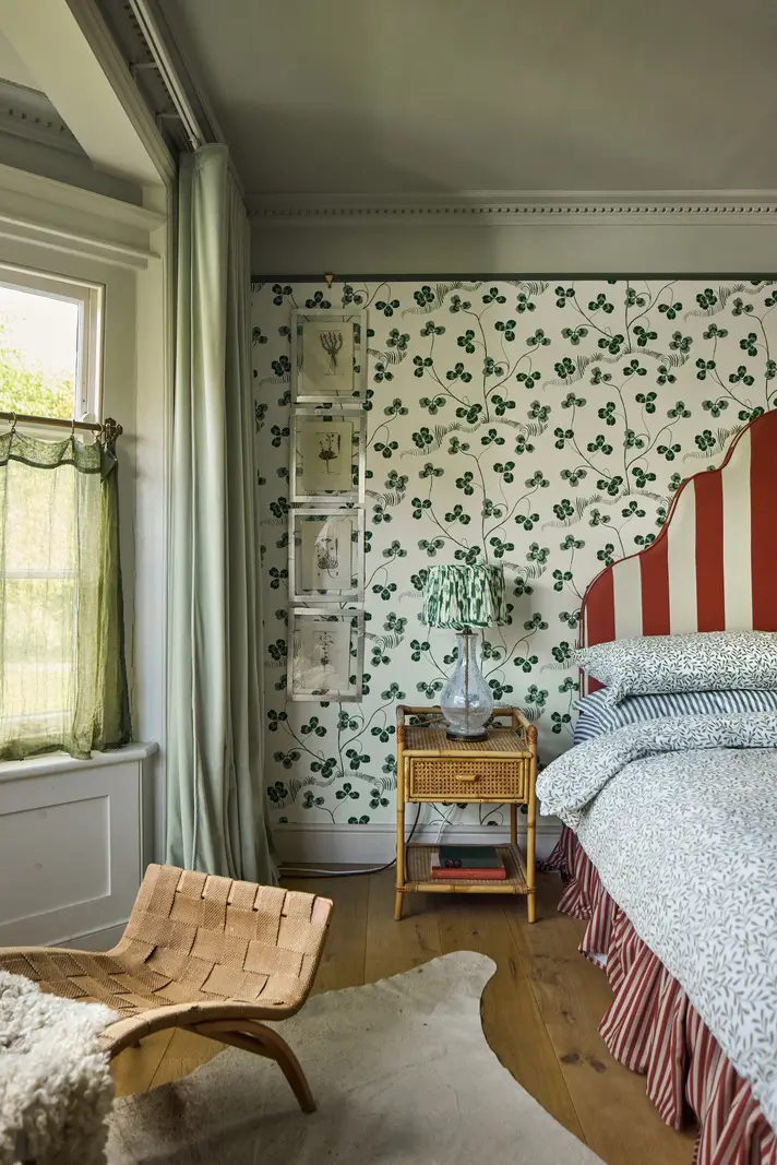 A deVOL Kitchen in a Beautiful Restored Georgian Townhouse in London 25 bedroom clover wallpaper striped headboard nordroom