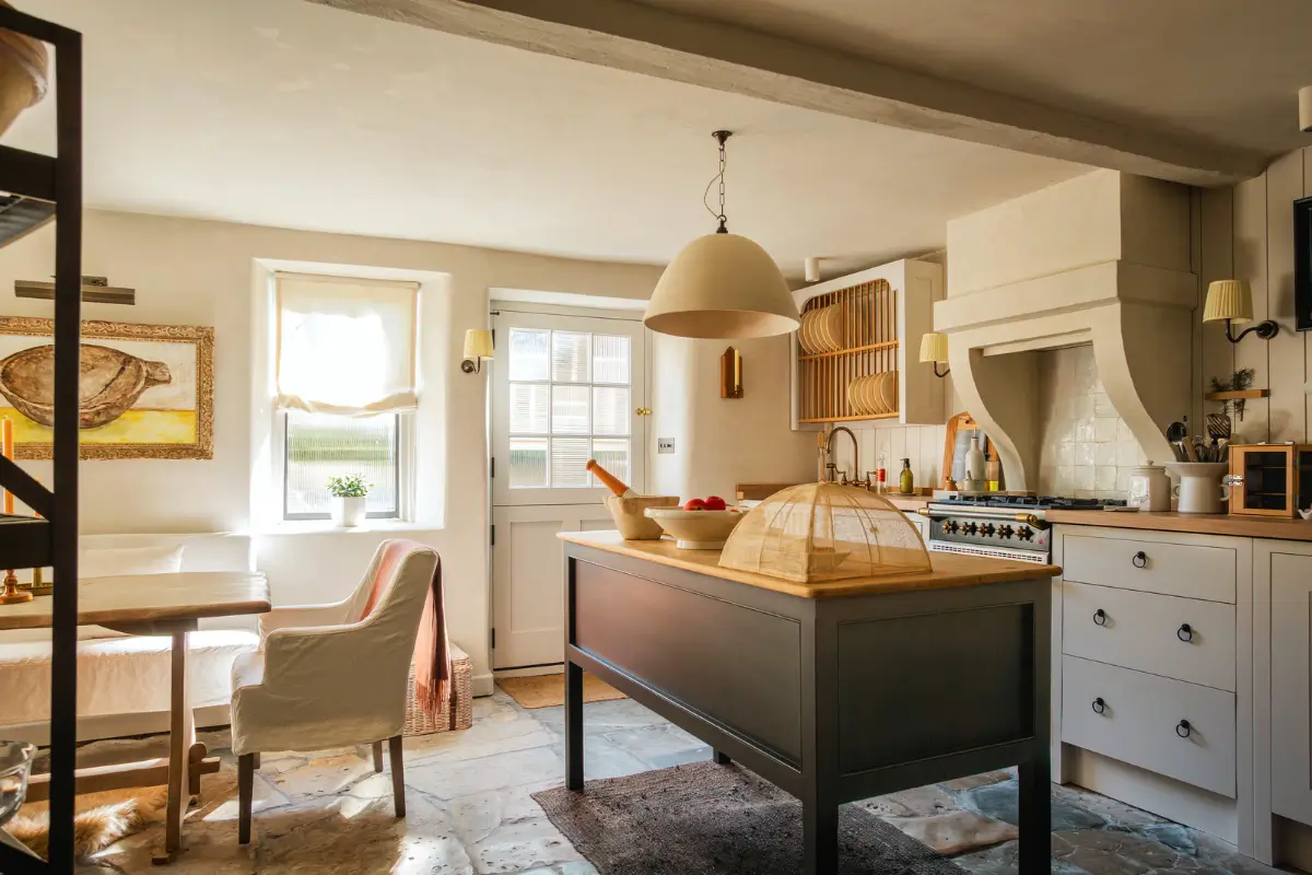 Lime Paint and Cozy Rooms in a Charming English Cottage 1 cottage kitchen with island and stone floor