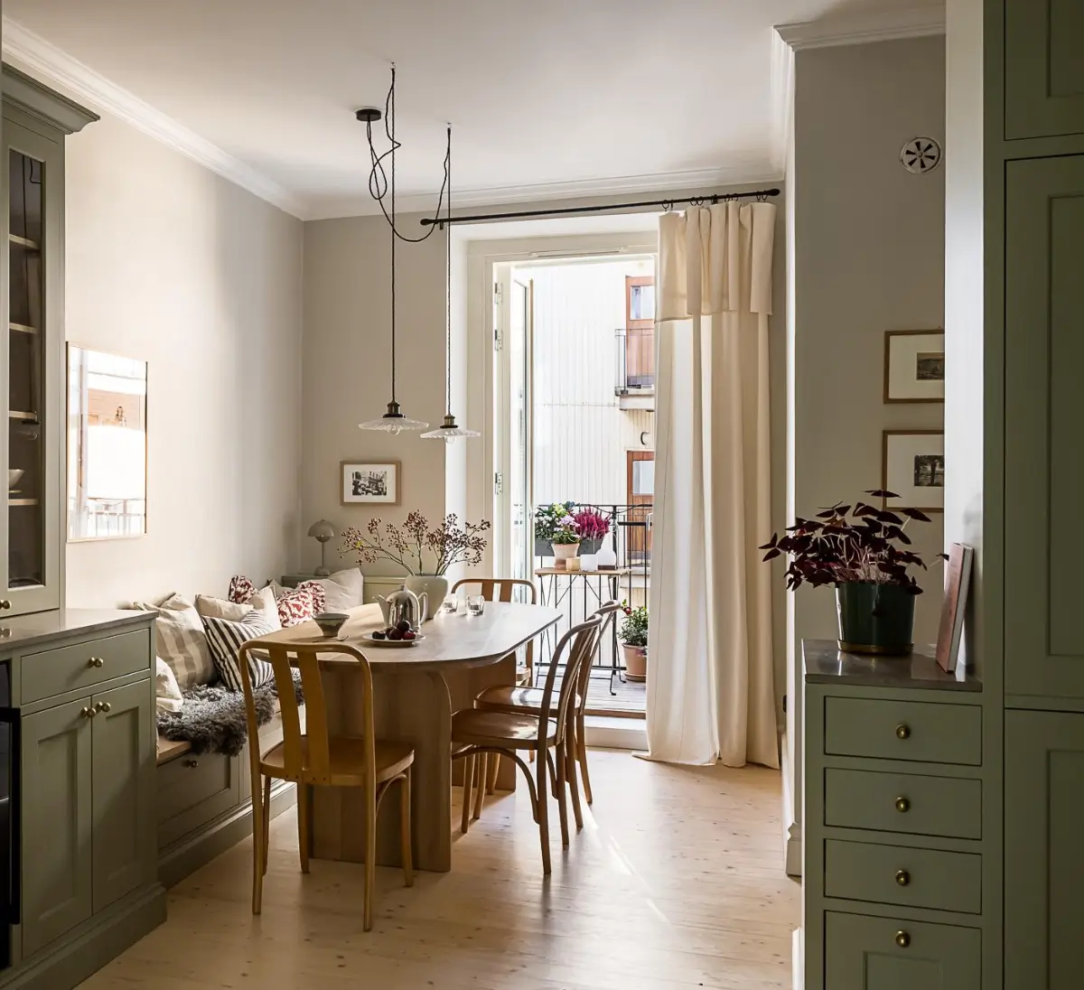 Best of 2025: Kitchens 55 green kitchen dining table with bench Best of 2025: Kitchens