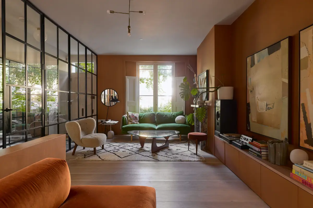 A Beautiful Victorian Townhouse Reimagined for Modern Living 1 open-plan-living-room-terracotta-walls-green-sofa-nordroom