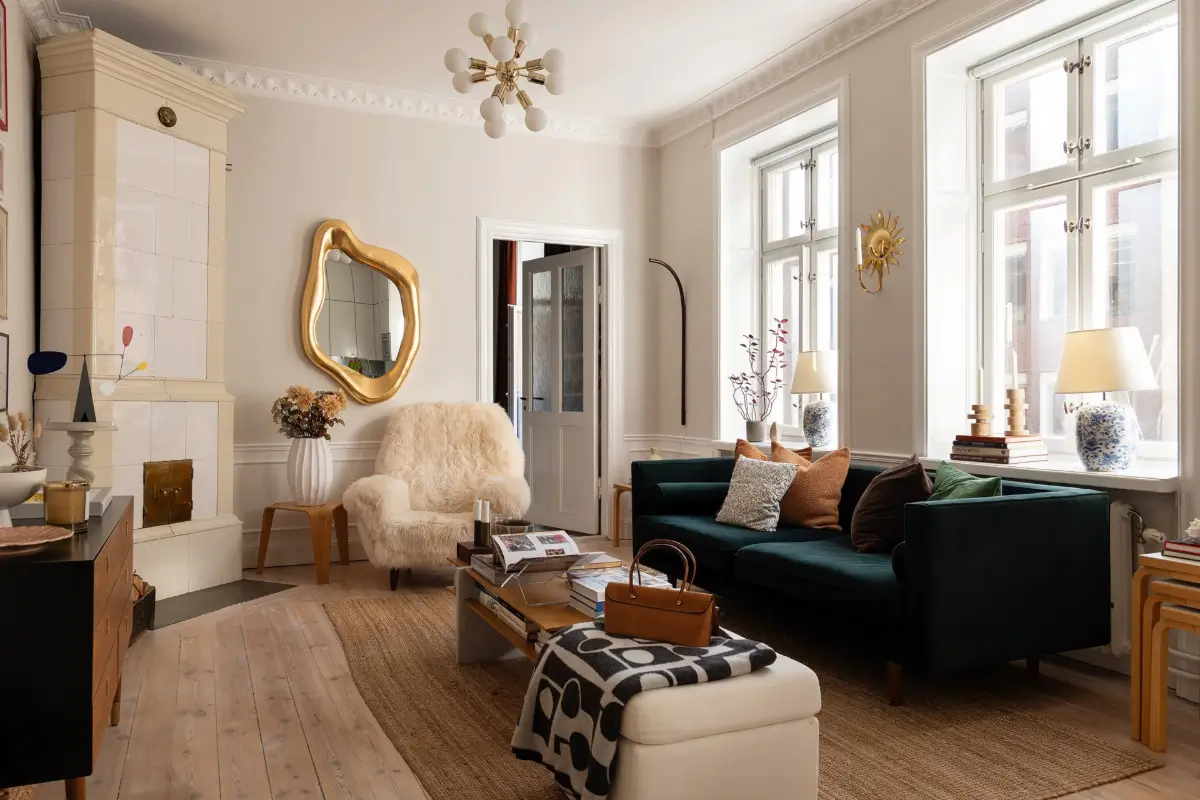 Neutral Tones and Period Character from the 1910s in a Stockholm Apartment 1 swedish living room large windows fireplace