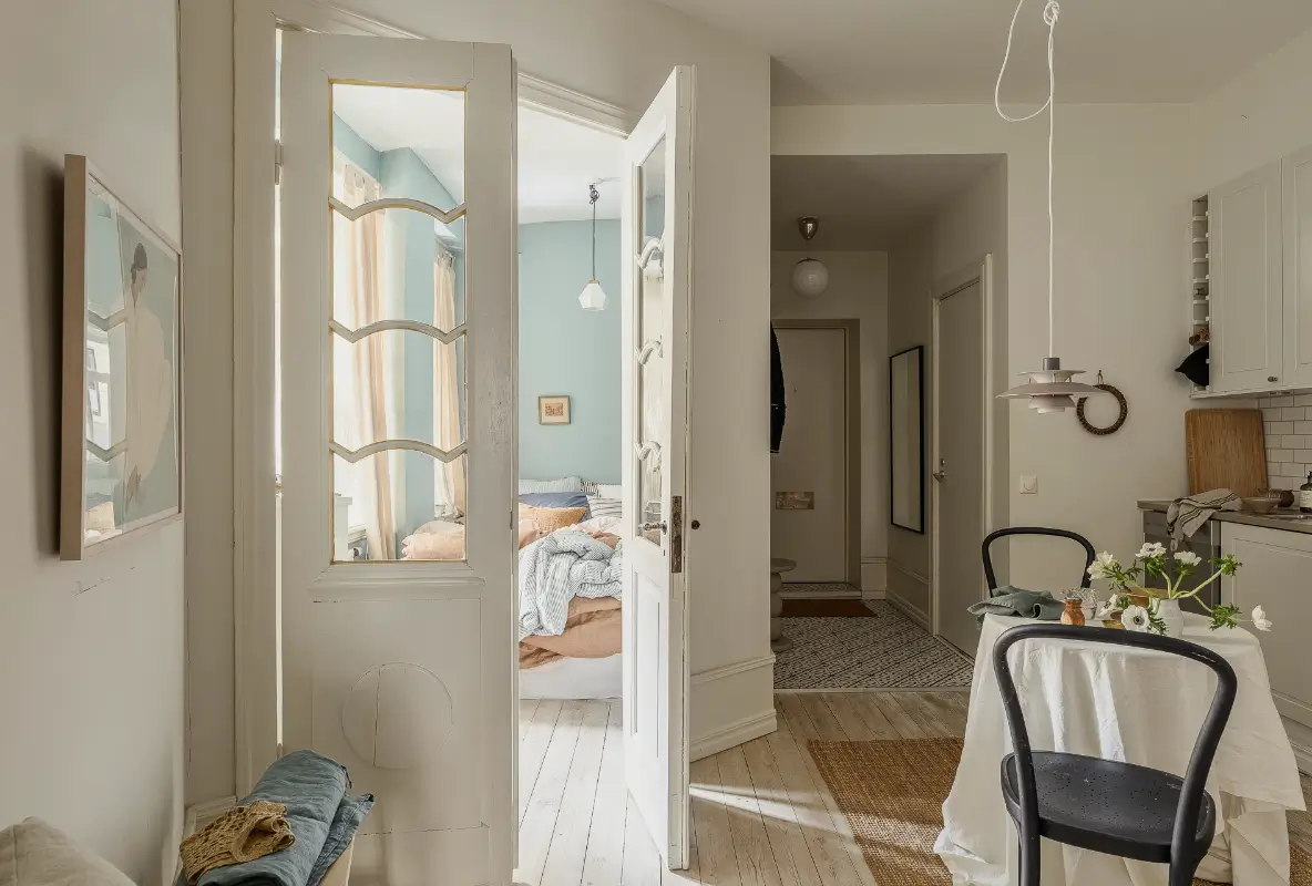 A Narrow Scandinavian Apartment with a Charming Blue Bedroom 1 turn-of-the-century-scandinavian-apartment-nordroom