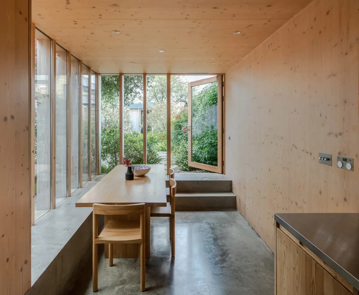 Spruce, Polished Concrete, and Terrazzo in an Architect-Designed London Home 2 modern-london-house-spruce-interiors-lush-garden