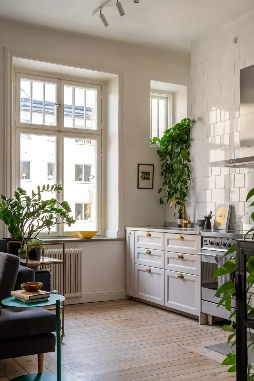 A Social Living Space and an Exposed Brick Wall in a Stockholm Apartment 9 classic-turn-of-the-century-stockholm-apartment-nordroom