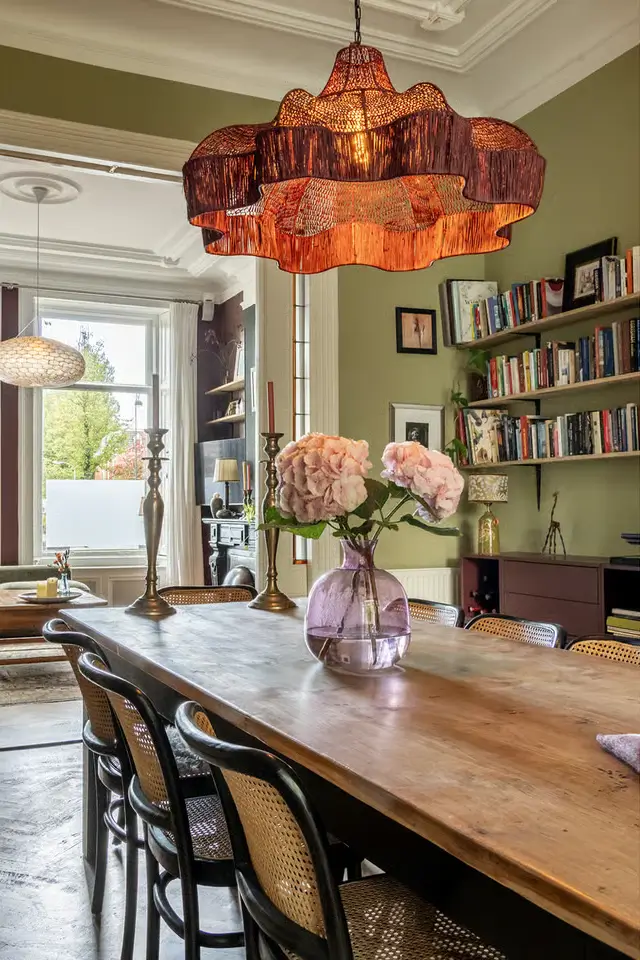 This Retro Color Can Add $2,277 to Your Home's Value (Another Can Cost You $18,000) 4 sage green dining room rustic table nordroom This Retro Color Can Add $2,277 to Your Home's Value (Another Can Cost You $18,000)