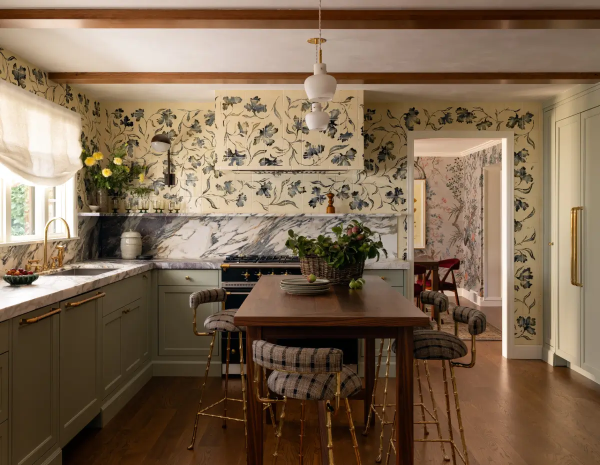 This Retro Color Can Add $2,277 to Your Home's Value (Another Can Cost You $18,000) 3 sage green ktichen cabinets floral tiles nordroom This Retro Color Can Add $2,277 to Your Home's Value (Another Can Cost You $18,000)