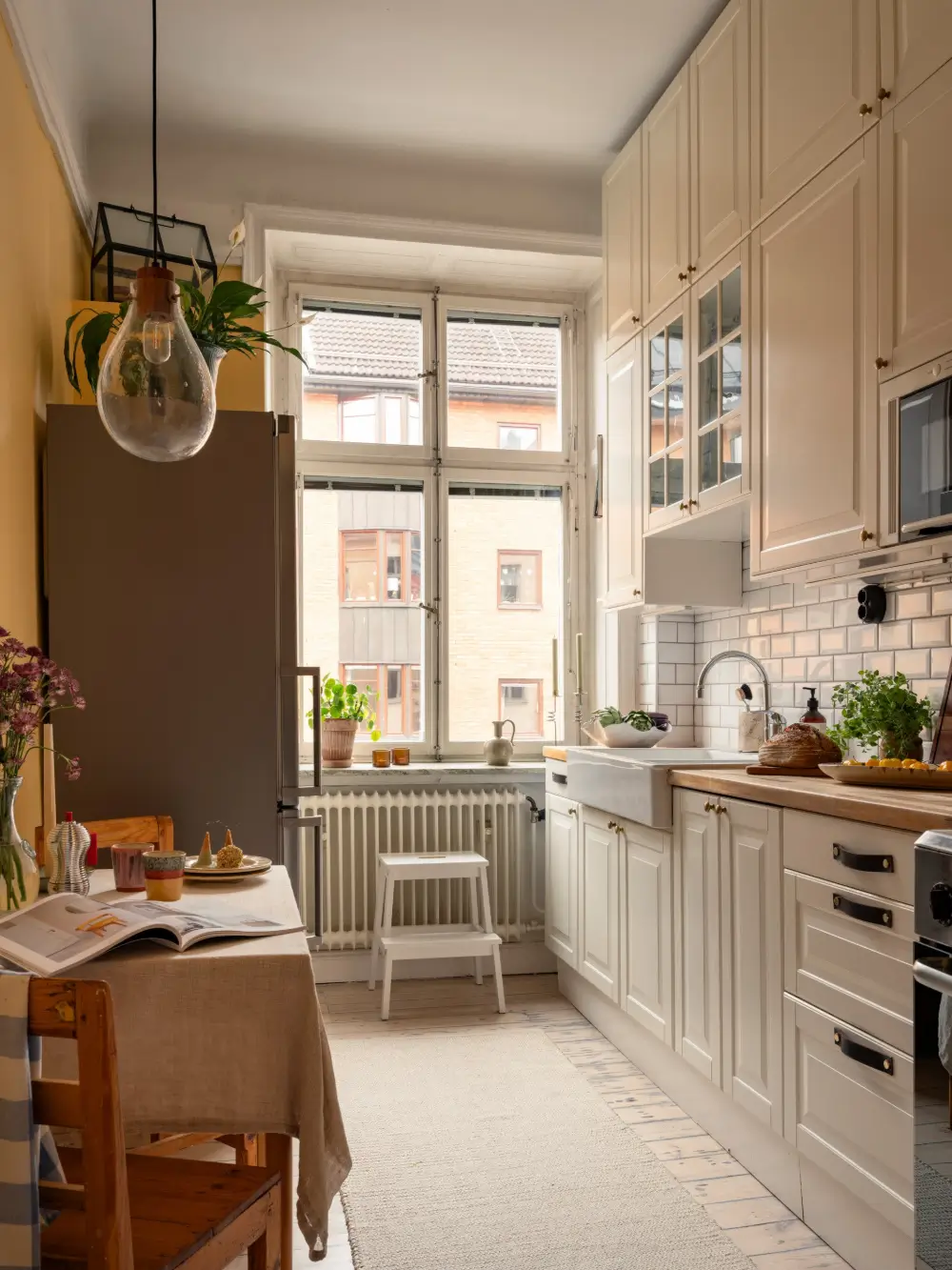 A Stylish Studio Apartment with a Sunny Yellow Kitchen 14 turn-of-the-century-studio-apartment-stockholm-nordroom