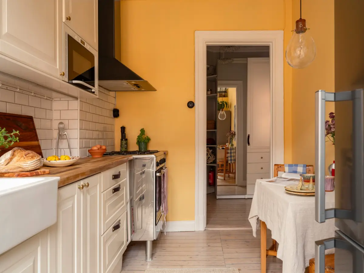 A Stylish Studio Apartment with a Sunny Yellow Kitchen 19 turn-of-the-century-studio-apartment-stockholm-nordroom