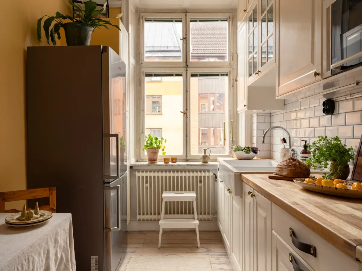 A Stylish Studio Apartment with a Sunny Yellow Kitchen 16 turn-of-the-century-studio-apartment-stockholm-nordroom
