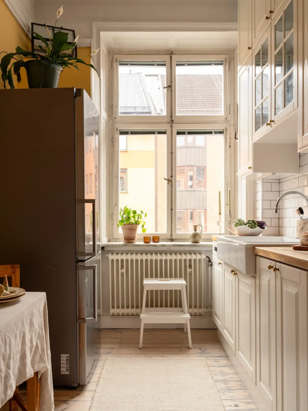 A Stylish Studio Apartment with a Sunny Yellow Kitchen 18 turn-of-the-century-studio-apartment-stockholm-nordroom