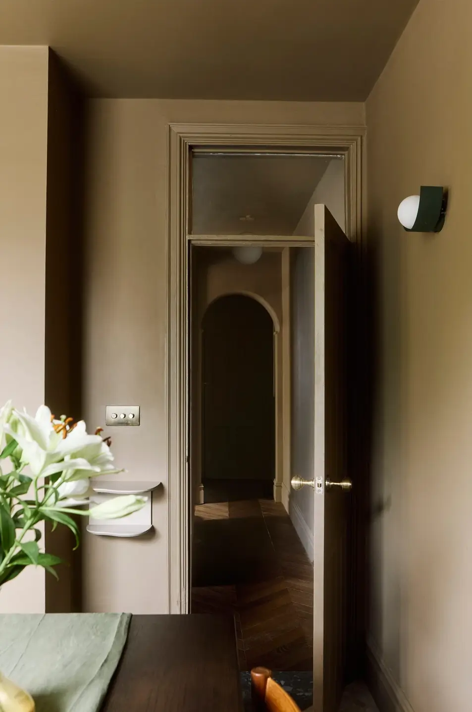 A Grounding Color Palette and Reinstated Period Features in an Edwardian Apartment 19 brown-blue-green-hues-london-apartment