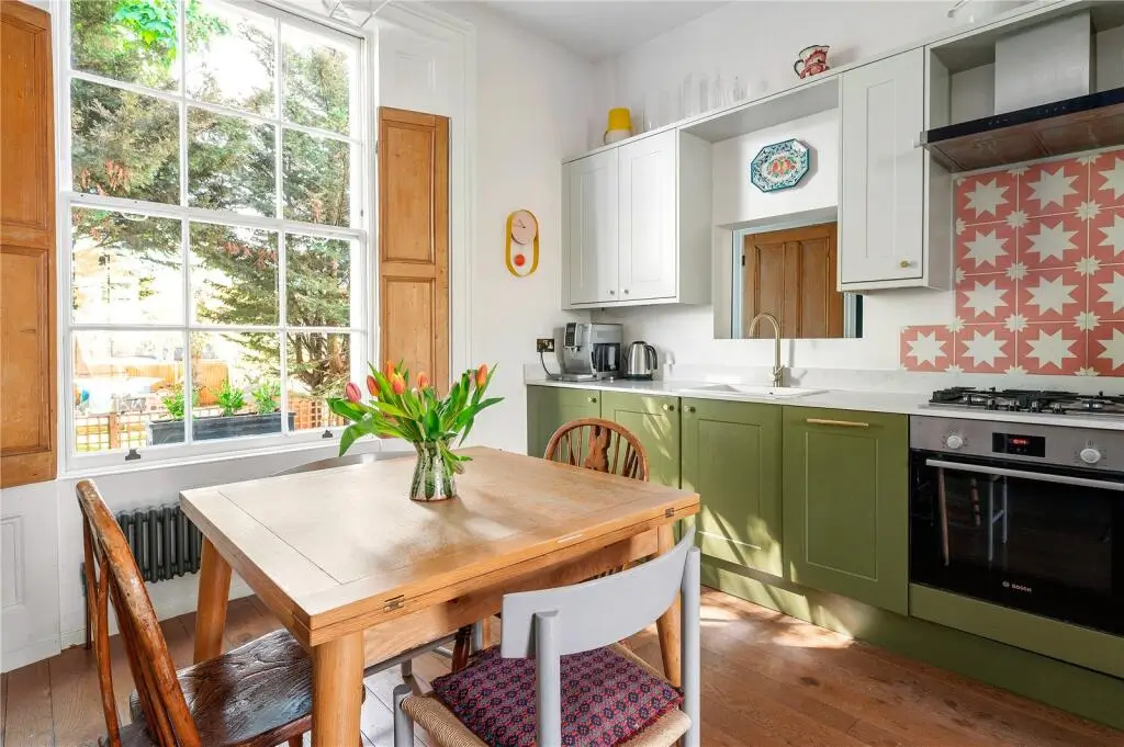 A Pink and Green Living Room in a Charming Victorian Family Home 5 pink-green-living-space-victorian-duplex-london
