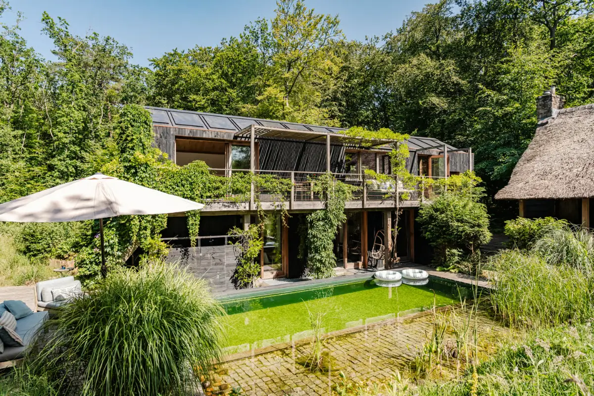 Nature is Part of Daily Life in This Sustainable Dutch Villa 2 unique-sustainable-house-garden-netherlands