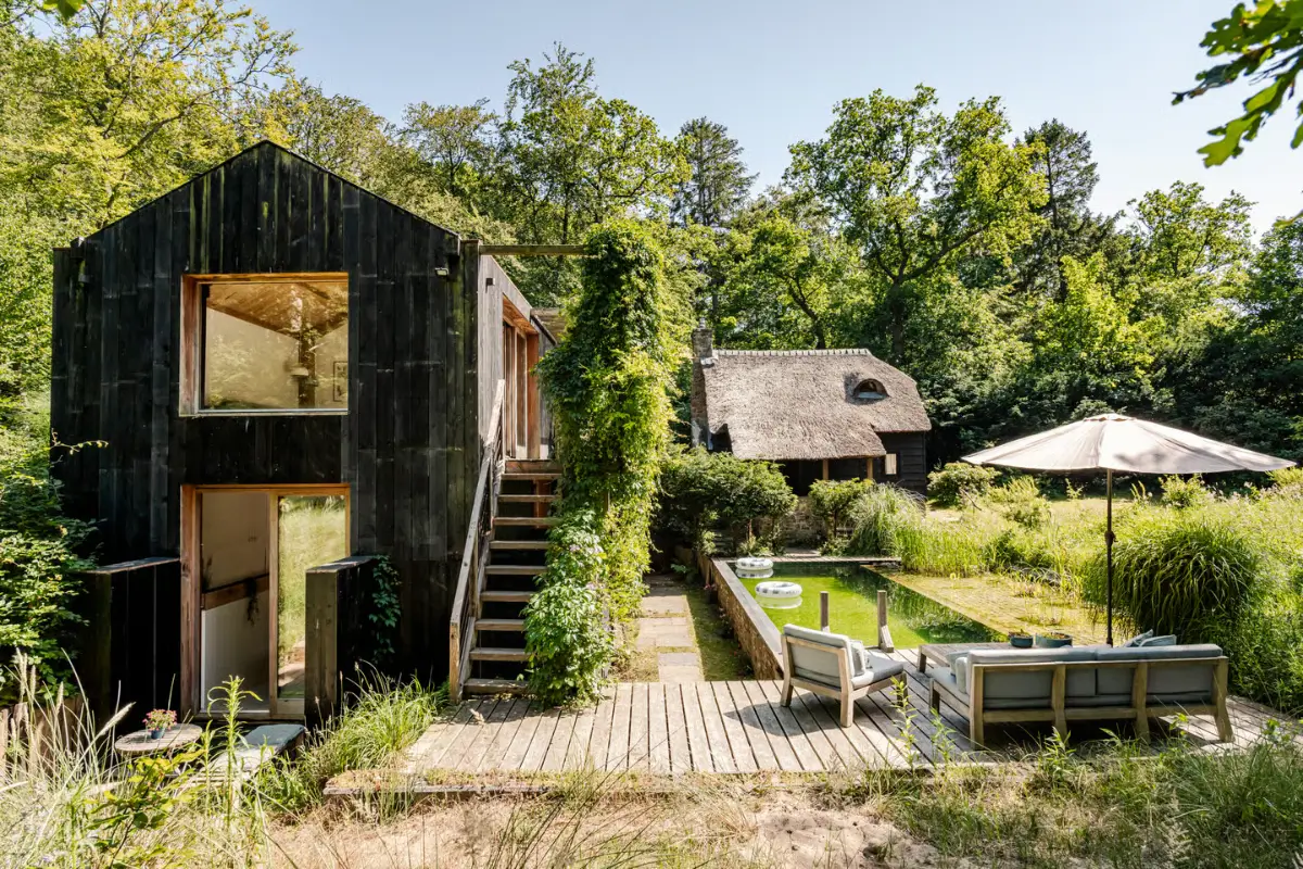 Nature is Part of Daily Life in This Sustainable Dutch Villa 1 unique-sustainable-house-garden-netherlands