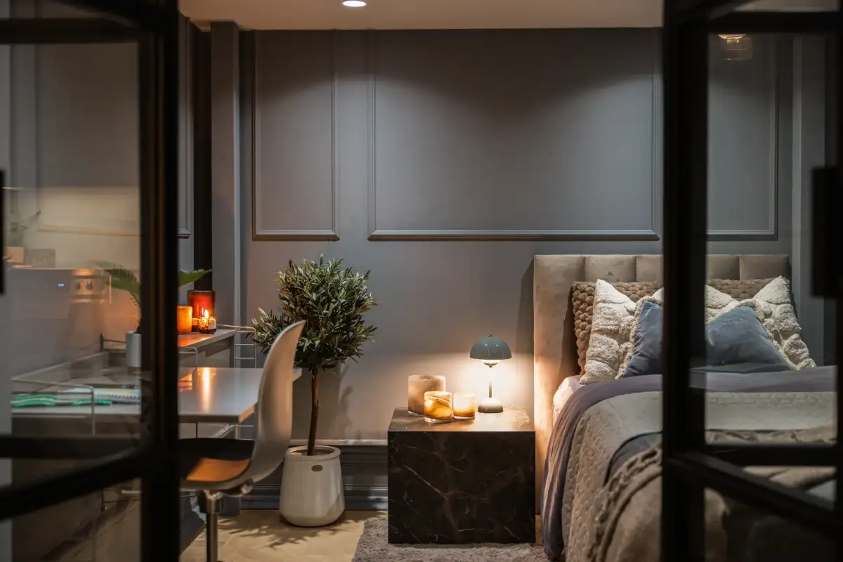 An Industrial Glass Wall Turns a Studio into a One-Bedroom Apartment 17 blue-studio-apartment-industrial-doors-loft-area-nordroom