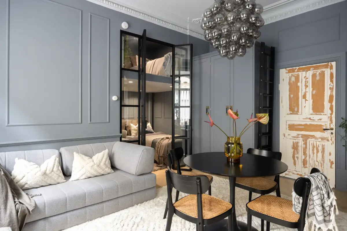 An Industrial Glass Wall Turns a Studio into a One-Bedroom Apartment 13 blue-studio-apartment-industrial-doors-loft-area-nordroom