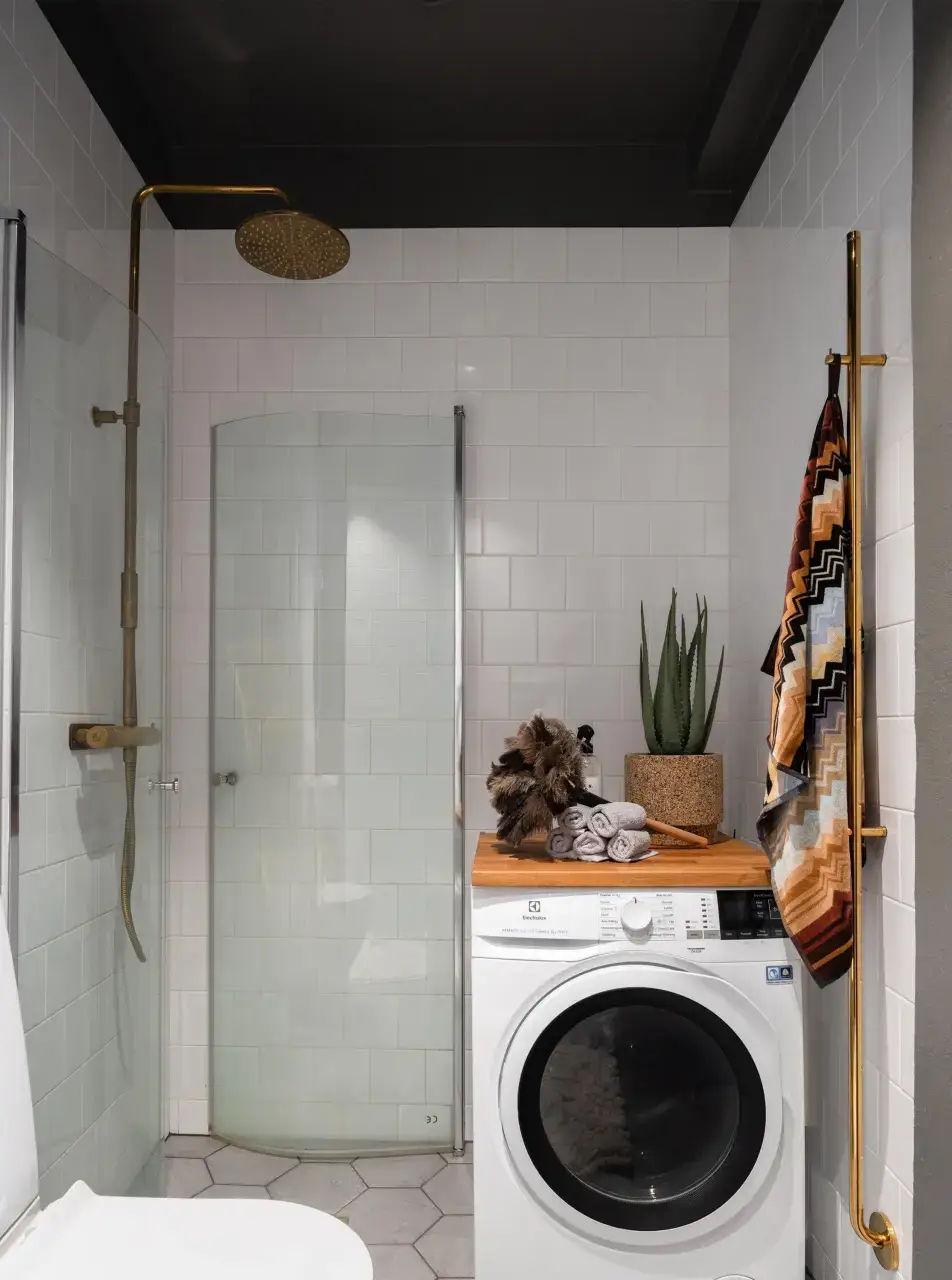 An Industrial Glass Wall Turns a Studio into a One-Bedroom Apartment 22 blue-studio-apartment-industrial-doors-loft-area-nordroom