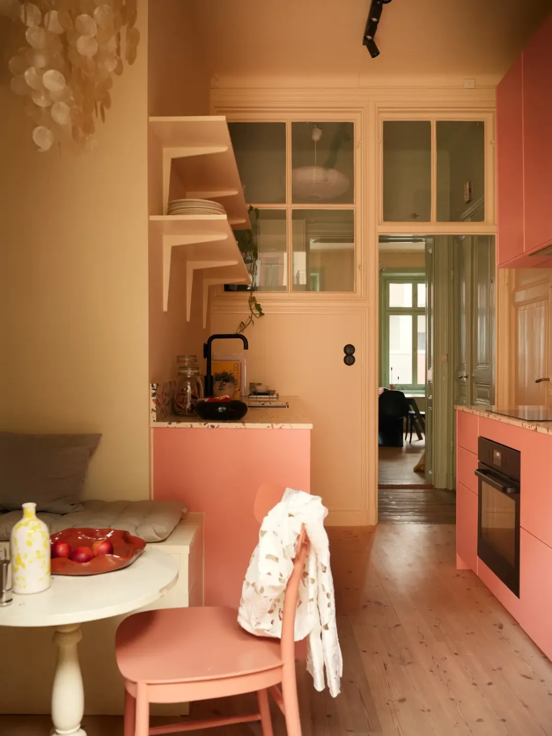 Before & After: A Colorful, Modern Update for a Late 19th-Century Apartment 32 pink-kitchen-painted-green-joinery-late-19th-century-stockholm-apartment-nordroom