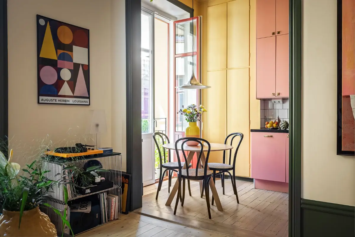 A Pink and Yellow Kitchen in a Colorful Turn-of-the-Century Studio Apartment 5 stockholm-studio-apartment-pink-yellow-kitchen-nordroom